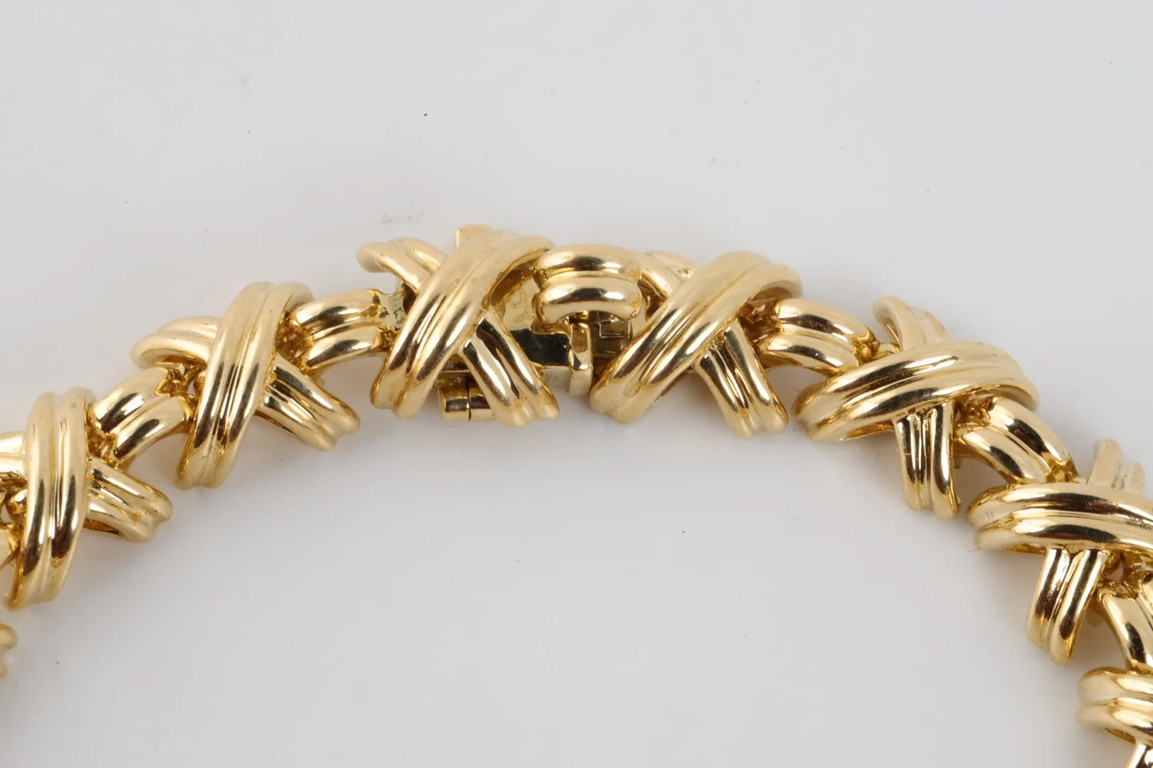 7" Tiffany & Co. 18k Yellow Gold Diamond Signature X Link Bracelet (29.19g.)