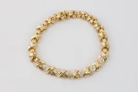 7" Tiffany & Co. 18k Yellow Gold Diamond Signature X Link Bracelet (29.19g.)